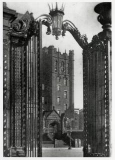 Grace Dodge Hall. Household Arts Tower seen through the gate to the grove. (1893).